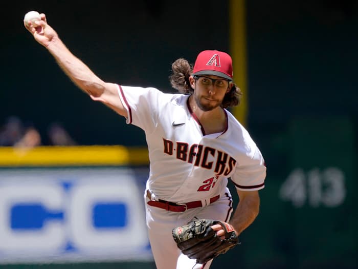 Arizona Diamondbacks starting pitcher Zac Gallen (23) throws against the Los Angeles Dodgers during the first inning of a baseball game, Wednesday, April 27, 2022, in Phoenix.